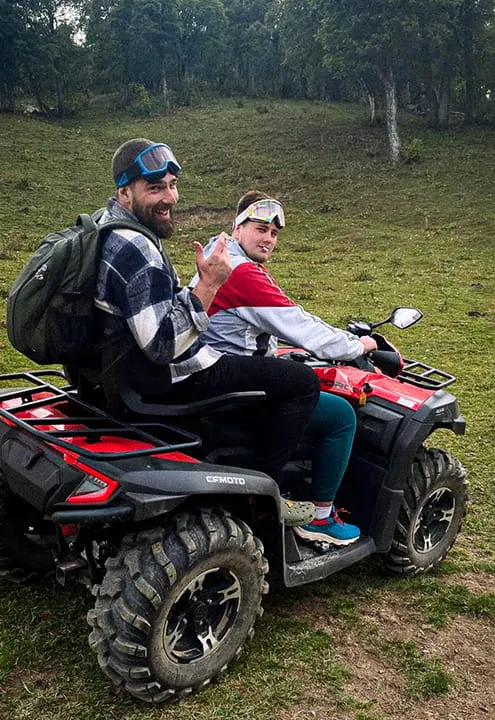 Two men on a quad bike