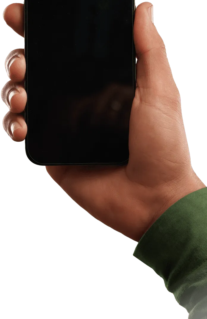 Hand holding a smartphone with the Olymptrade trading platform